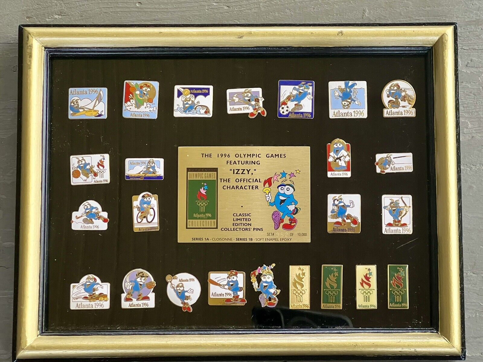 USA TEAM ATLANTA 1996 OLYMPIC GAMES IZZY OLYMPIAD  PIN COLLECTION framed