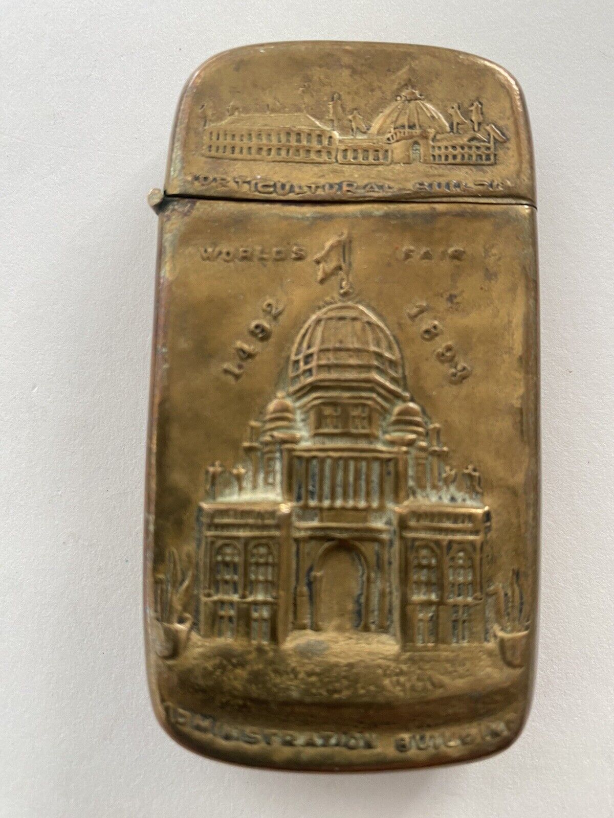 1893-Columbian Worlds Fair Brass Match Safe-Embossed administrative Building