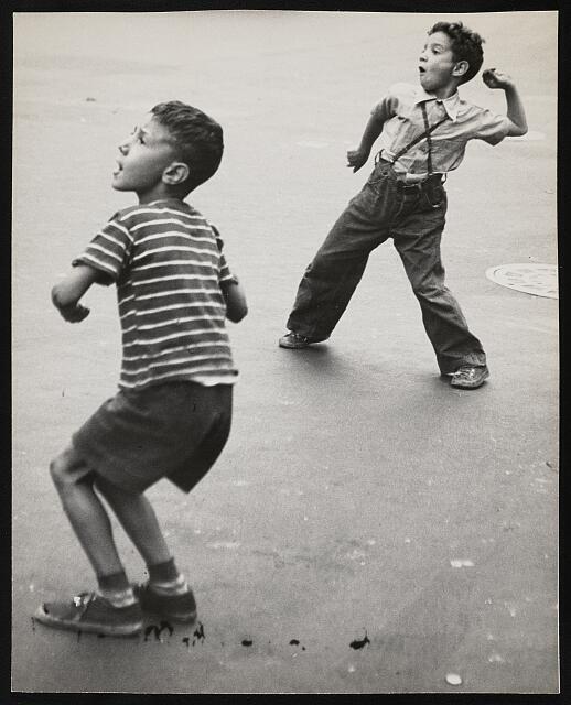 Photo:Two unidentified boys throwing
