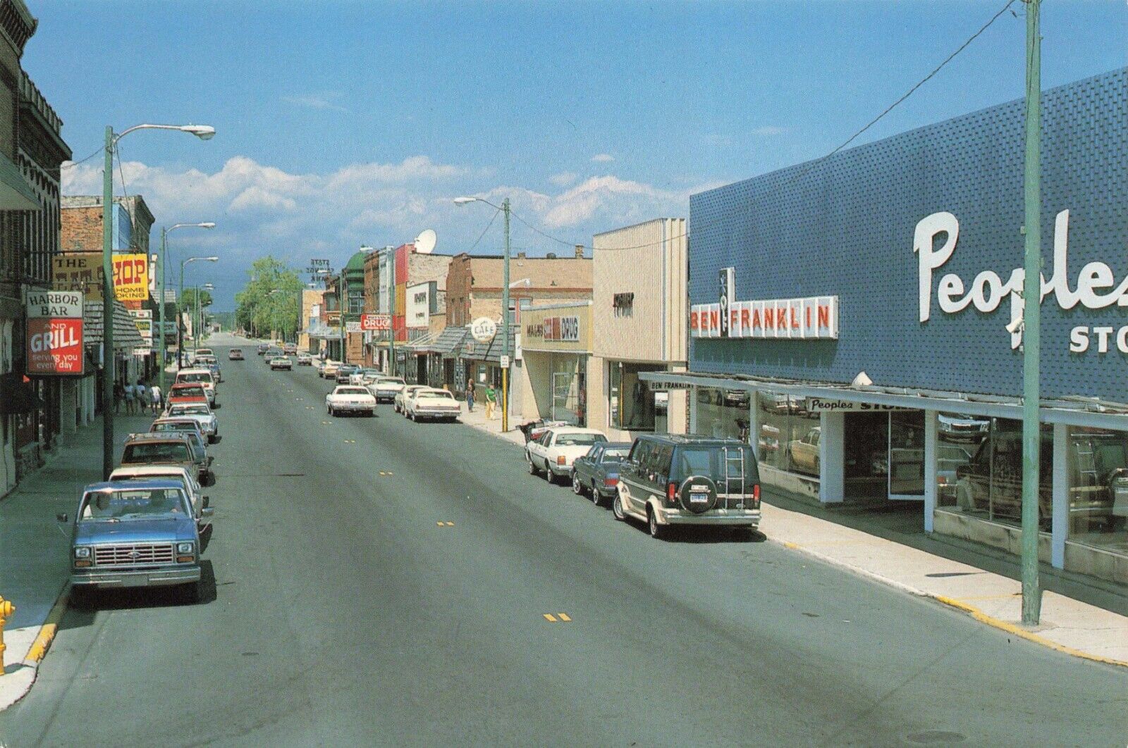 Postcard MI Manistique Street View Stores Cars Bar Van Schoolcraft County 6x4