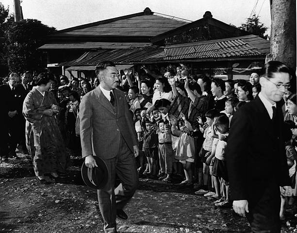 Emperor Hirohito and Empress Nagako visit with a crowd of well wis- Old Photo