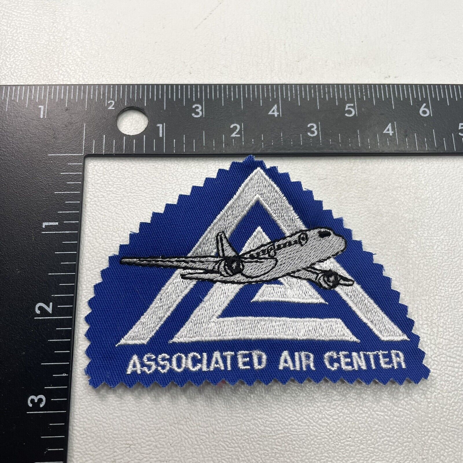 Zig-Zag-Cut-From-Hat Patch-ish Piece ASSOCIATED AIR CENTER (Gray Airplane) 32R6