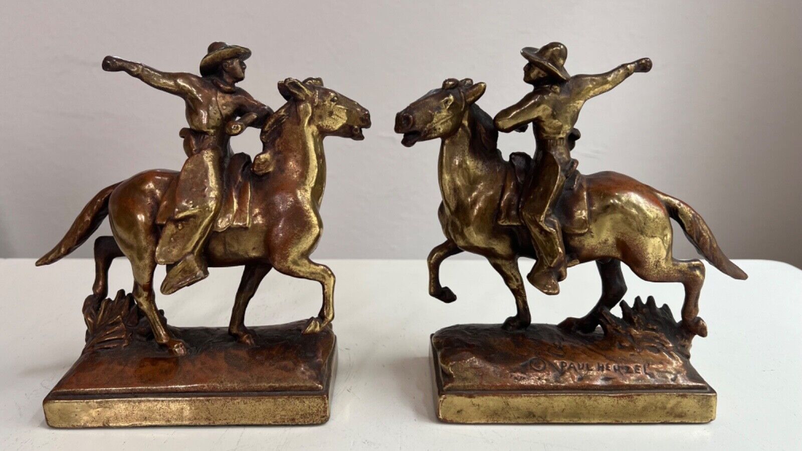 ANTIQUE PAUL HERZEL POMPEIAN BRONZE CLAD COWBOY HORSE RODEO ART STATUE BOOKENDS