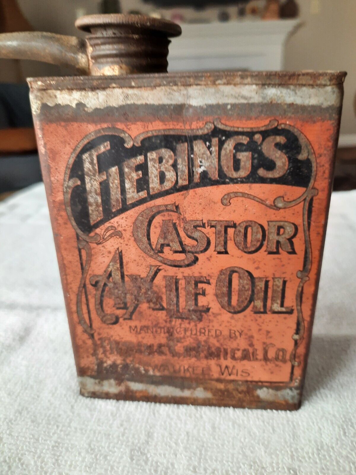 Antique FIEBING\'S CASTOR AXLE OIL TIN hand stenciled label with original cap