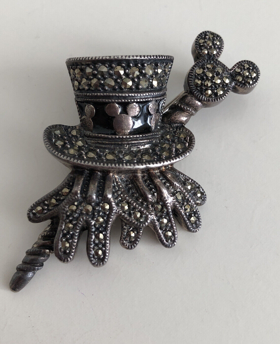 DISNEY VINTAGE BROOCH. MICKEY MOUSE TOP HAT, GLOVES AND CANE, MARCASITE