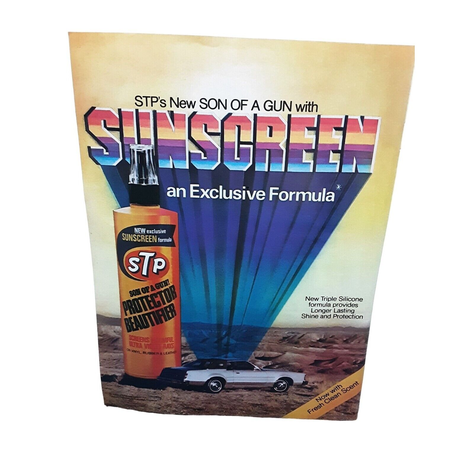 1981 STP Sunscreen Protector with Chrysler Cordoba Paul Mason Pinot Ad Vintage