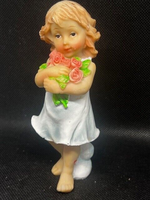 Vintage WMG Girl Holding Flowers Heart on Leg Figurine