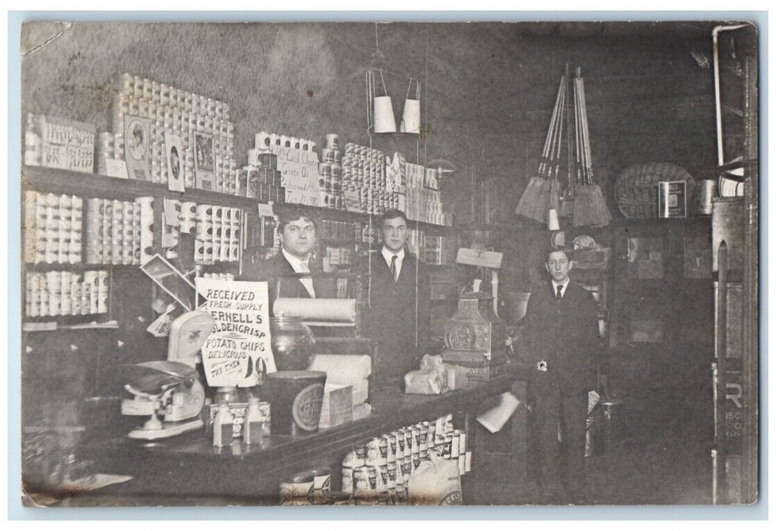 1910 Business Shop Interior View Cans Broom Workers Kent OH RPPC Photo Postcard