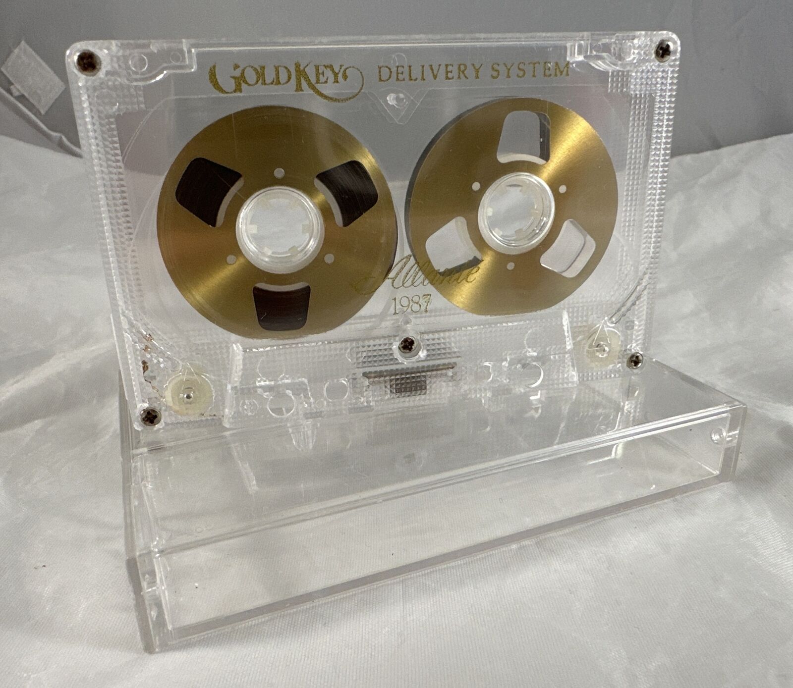 Vintage Cadillac Gold Key Delivery System Allante Cassette Tape (1987).