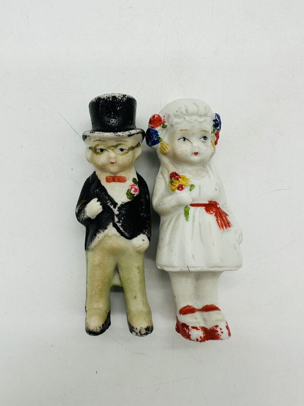 Antique Japanese Porcelain Boy & Girl Flower Tuxedo Figurine Ceramic Pair Figure