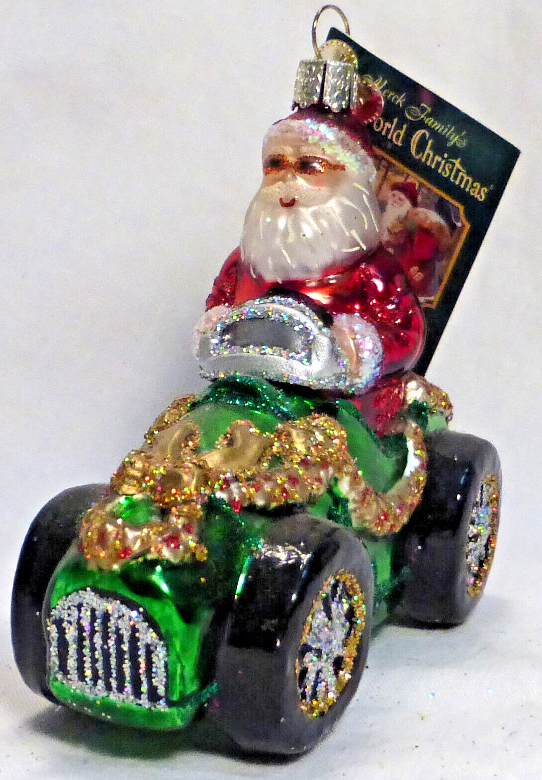 OWC Old World Christmas Blown Glass Santa in Roadster #40080 race car automobile