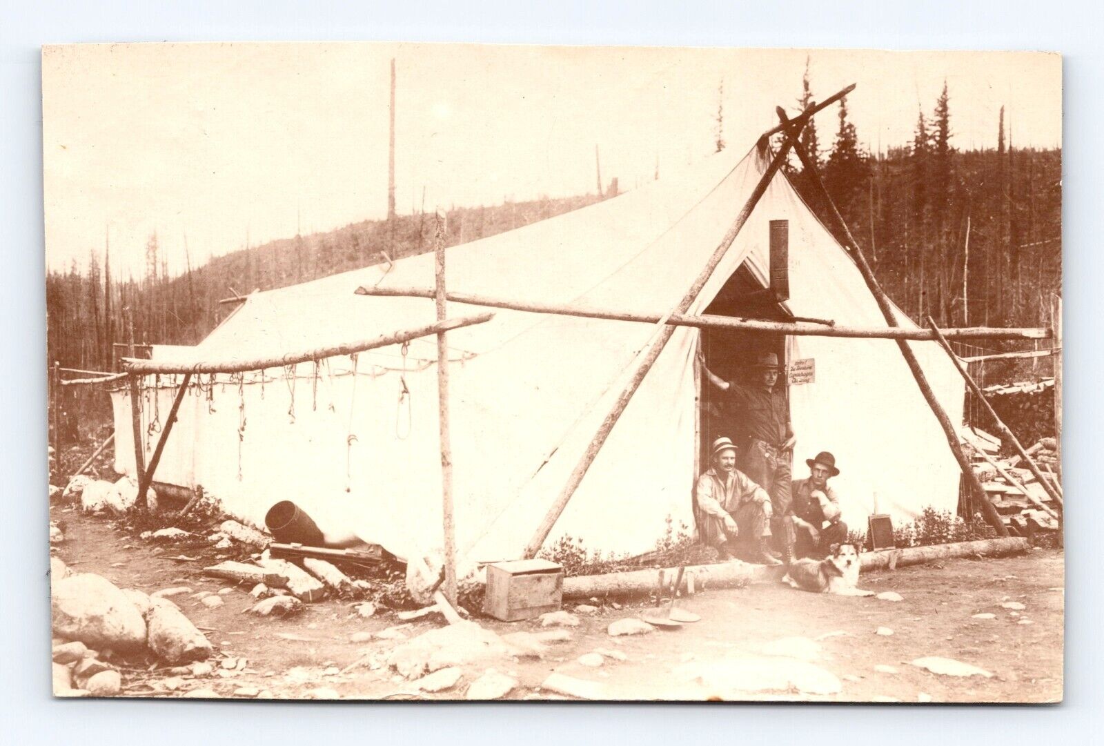 Postcard RPPC Photo Huge Hunting Camp Trapper's Canvas Tent Mountain 1908