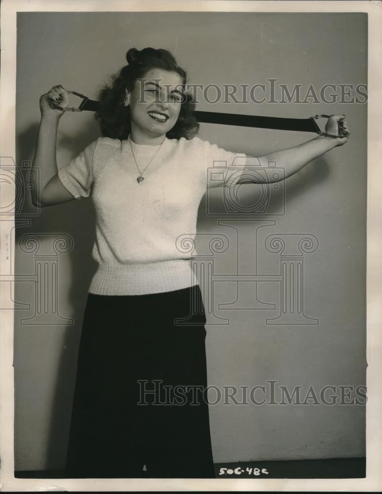 1948 Press Photo Lucille McCullough Graduated Xercisor Goodyear supplies rubber