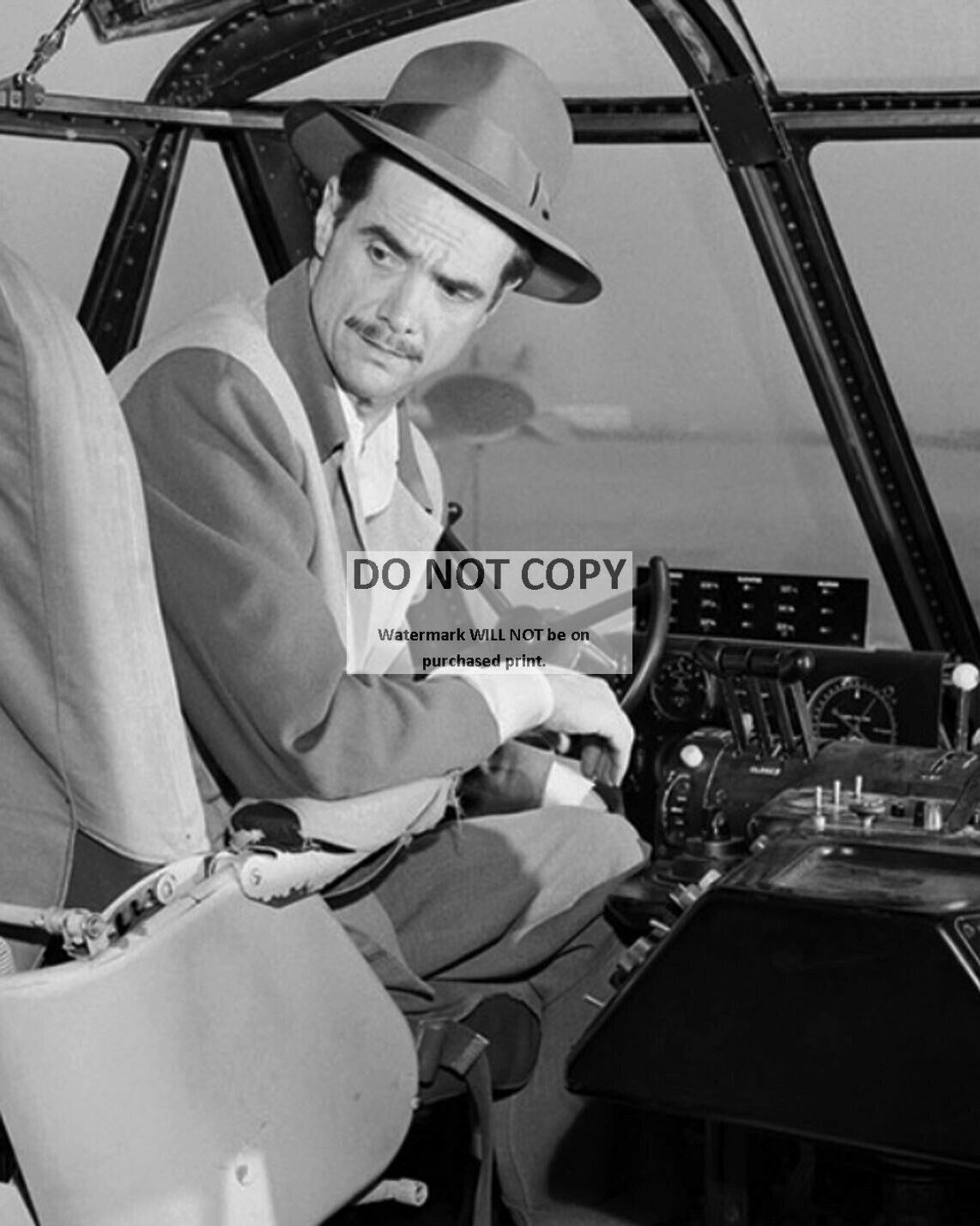 HOWARD HUGHES IN THE COCKPIT OF THE \