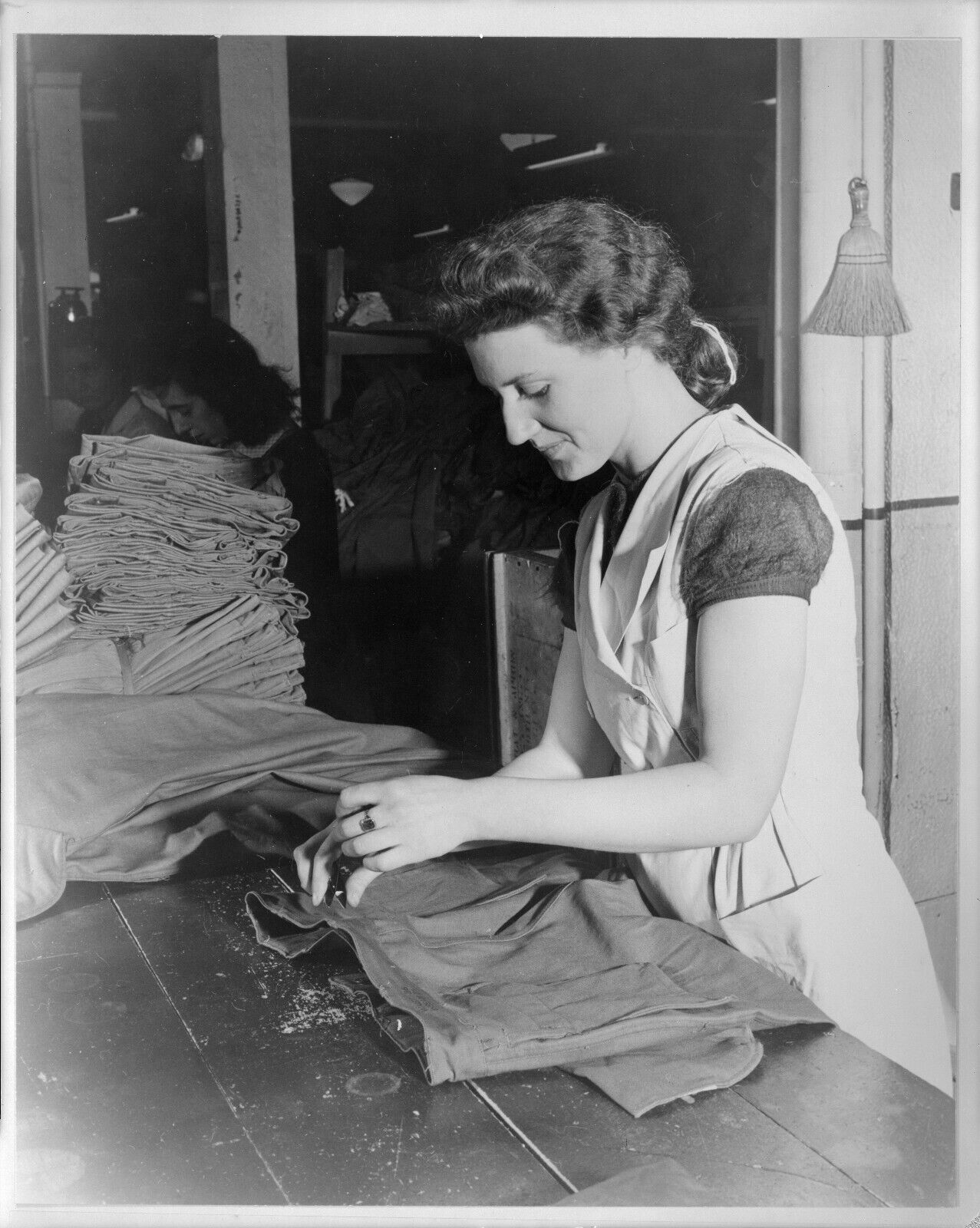 WW1 War Time 8x10 Photo Woman Examiner clipping threads from finished uniforms
