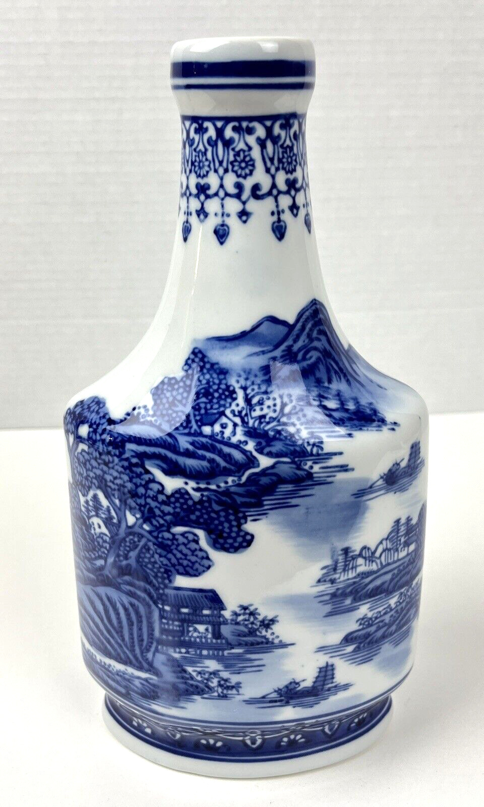 Formalities by Baum Bros. Porcelain Blue & White Asian Scenery 10 1/2” Vase