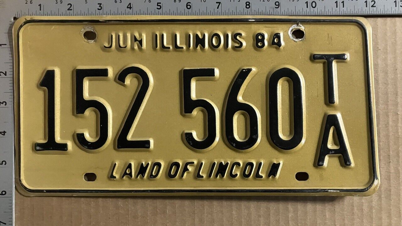 1984 Illinois trailer license plate 152 560 TA YOM DMV for your TRAILER 12134