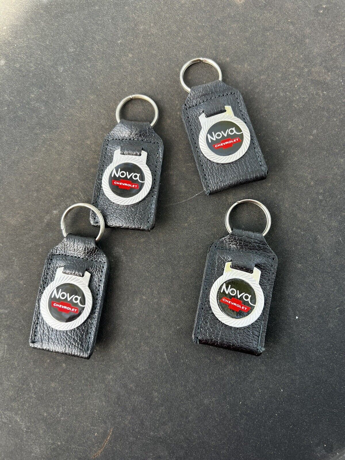 4 New NOS Vintage 60's/70’s/80s Nova Chevrolet leather keychain key ring holder