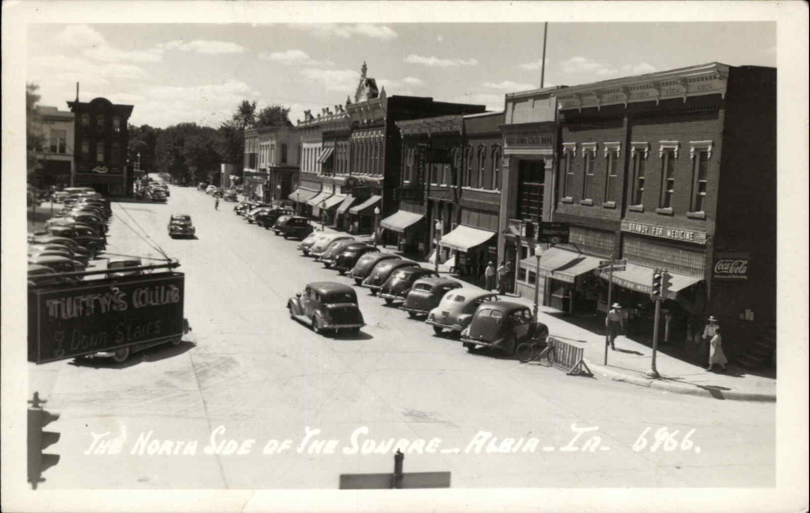 Albia Iowa IA Street Scene Classic 1940s Cars Coca Cola Real Photo RPPC Postcard