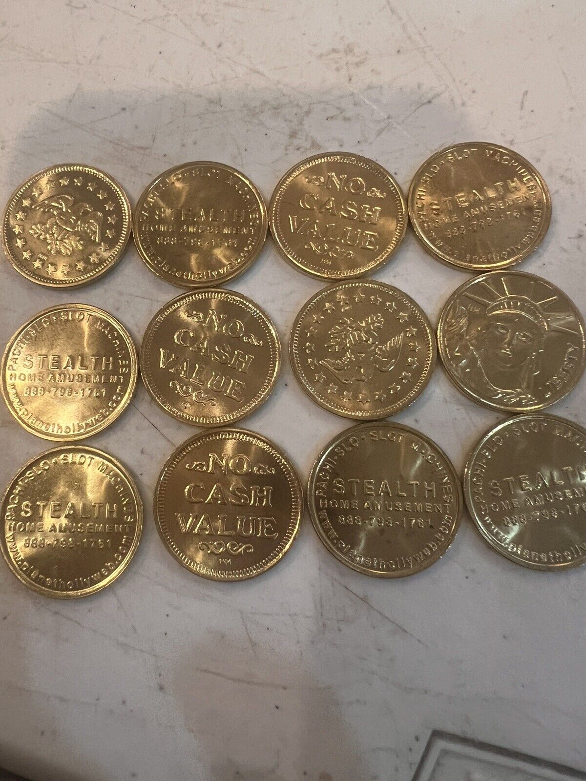 BRAND NEW 100 GOLD TONE AUTHENTIC PACHISLO SLOT MACHINE TOKENS NEW 1 LOT OF 100