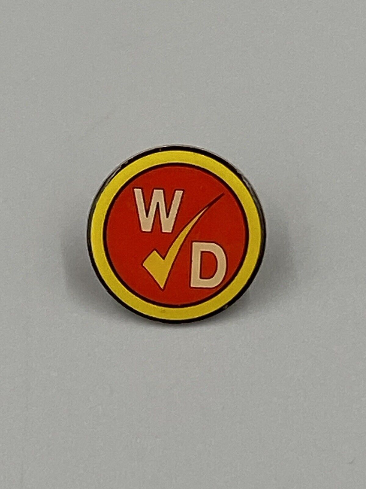 Vintage WINN DIXIE Red And Yellow Round Lapel Pin Brooch