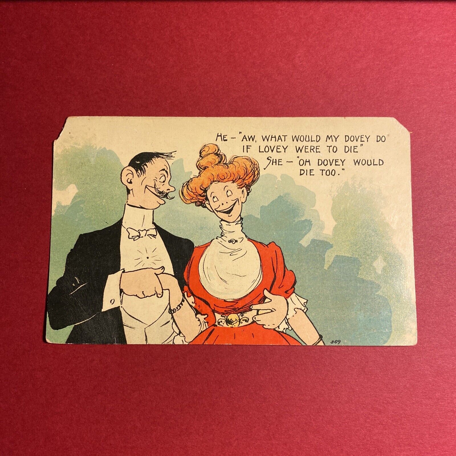 (1) Antique Postcard Of Young Couple Joking About Death Printed In Britain 1909
