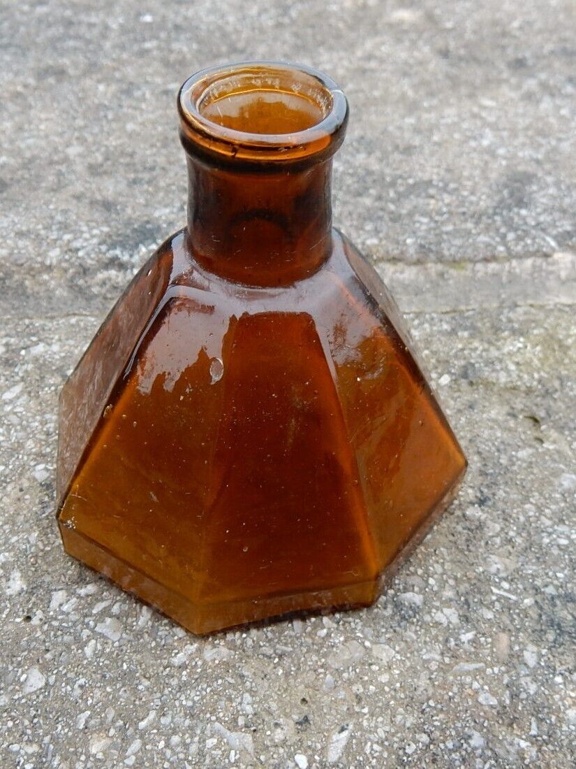 Amber glass pontilled American eight sided umbrella ink bottle mid 19th century