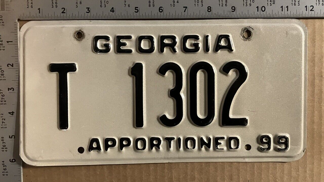 1999 Georgia apportioned trailer license plate T 1302 TRUCKING 13506