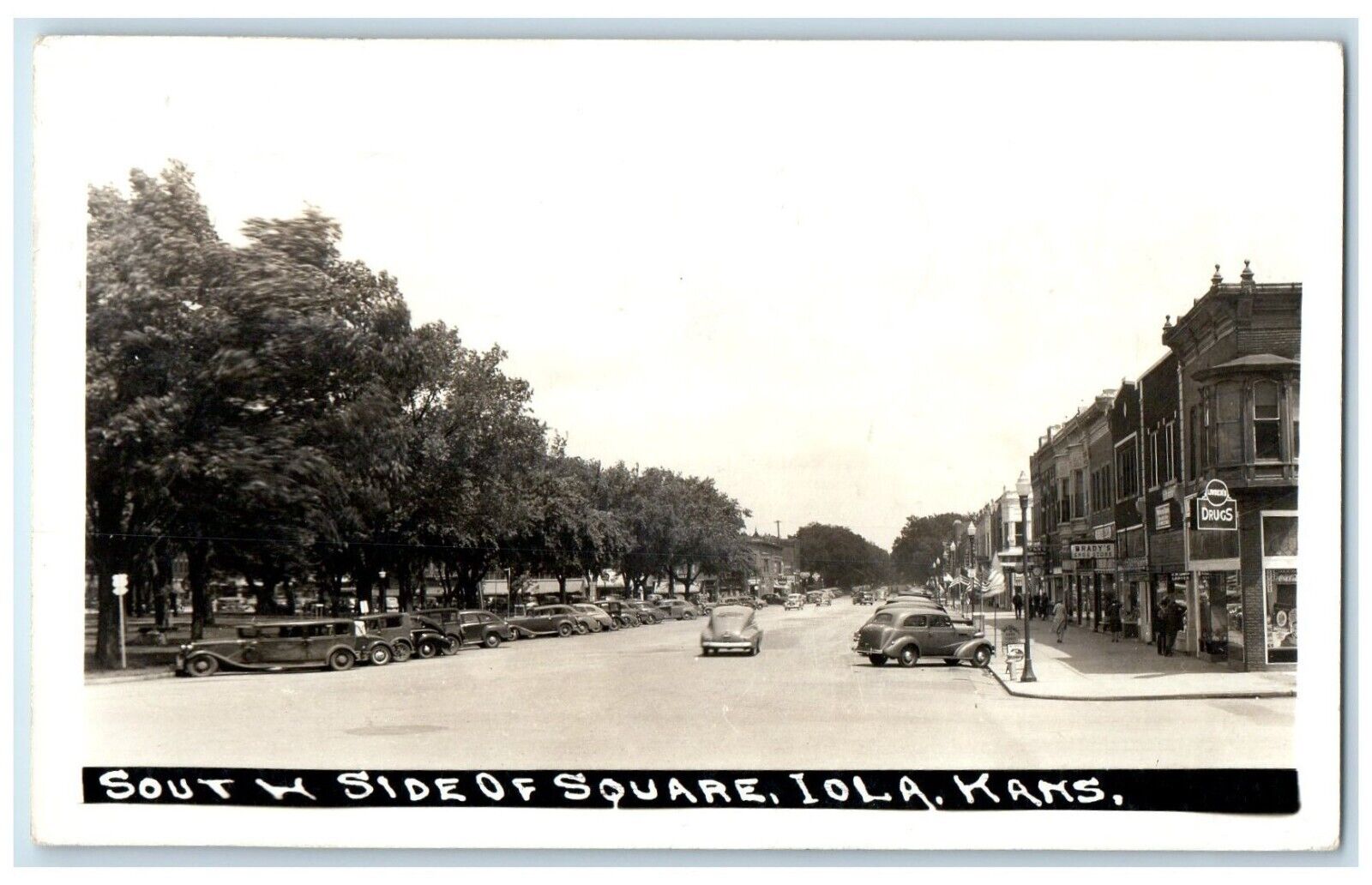 1946 South W Side Of Square Brady\'s Store Iola Kansas KS RPPC Photo Postcard