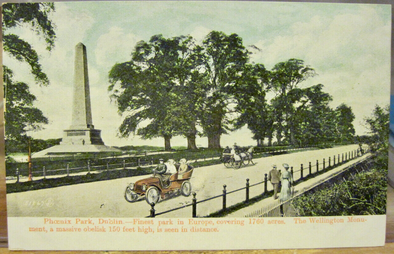 Irish Postcard PHOENIX PARK Wellington Monument Dublin Ireland JV51247 Red Car 