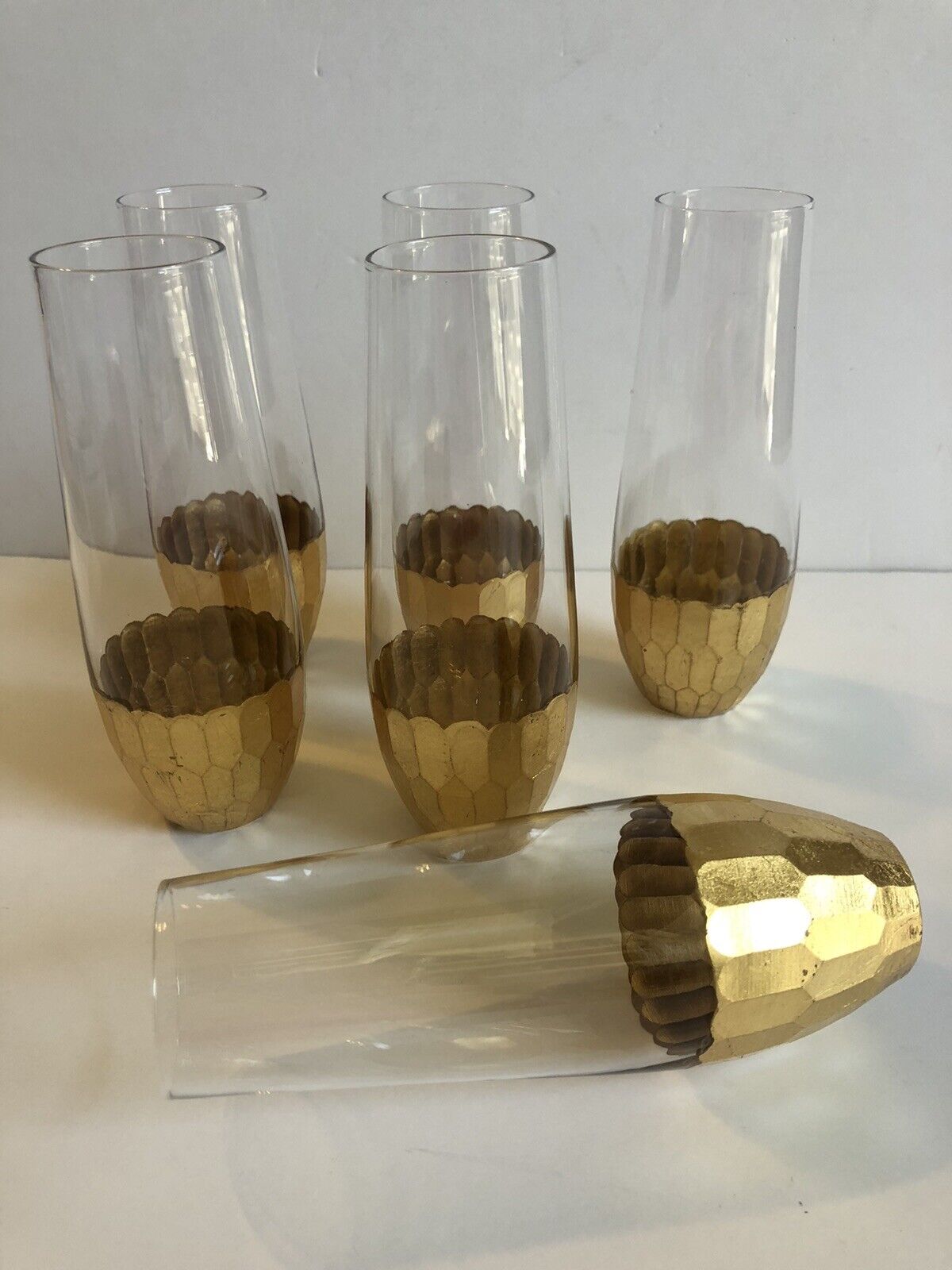 Lovely set of 6 Stemless Champagne Glasses with Honeycomb Gold Painted Bottoms.