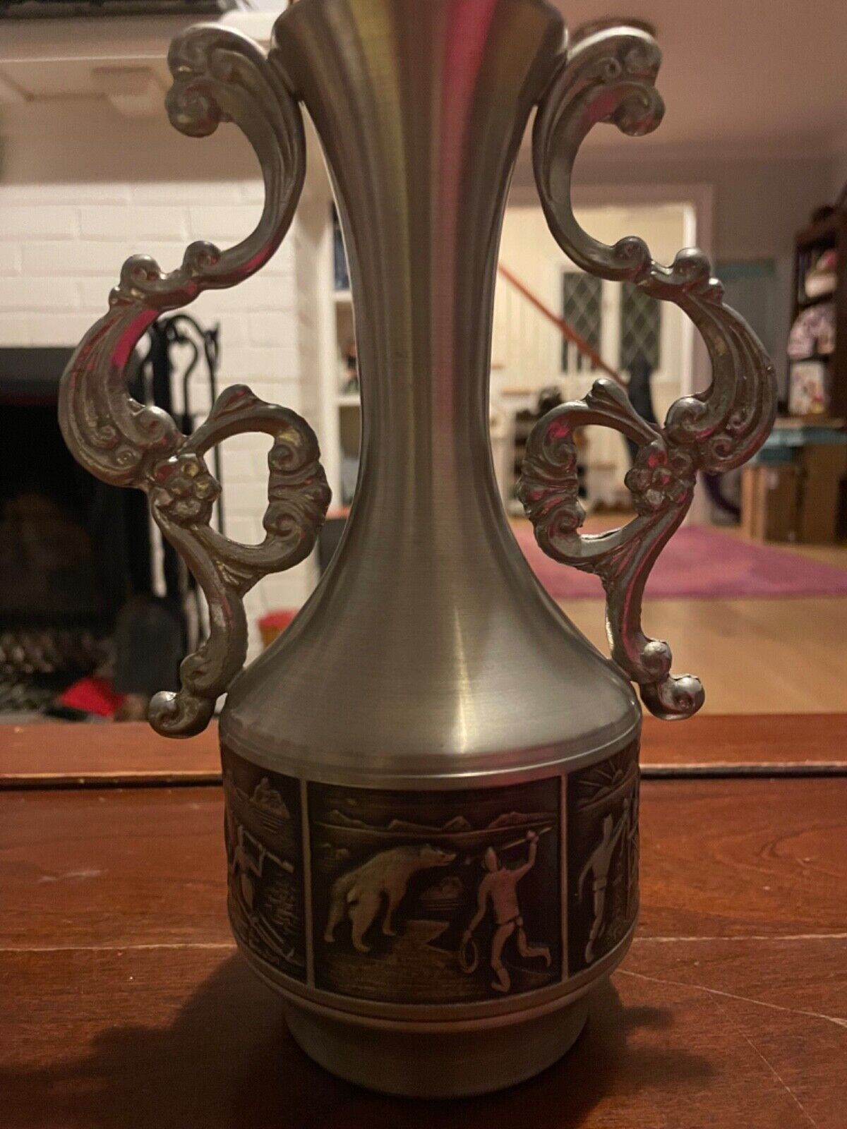 vintage pewter vase with adventure etchings