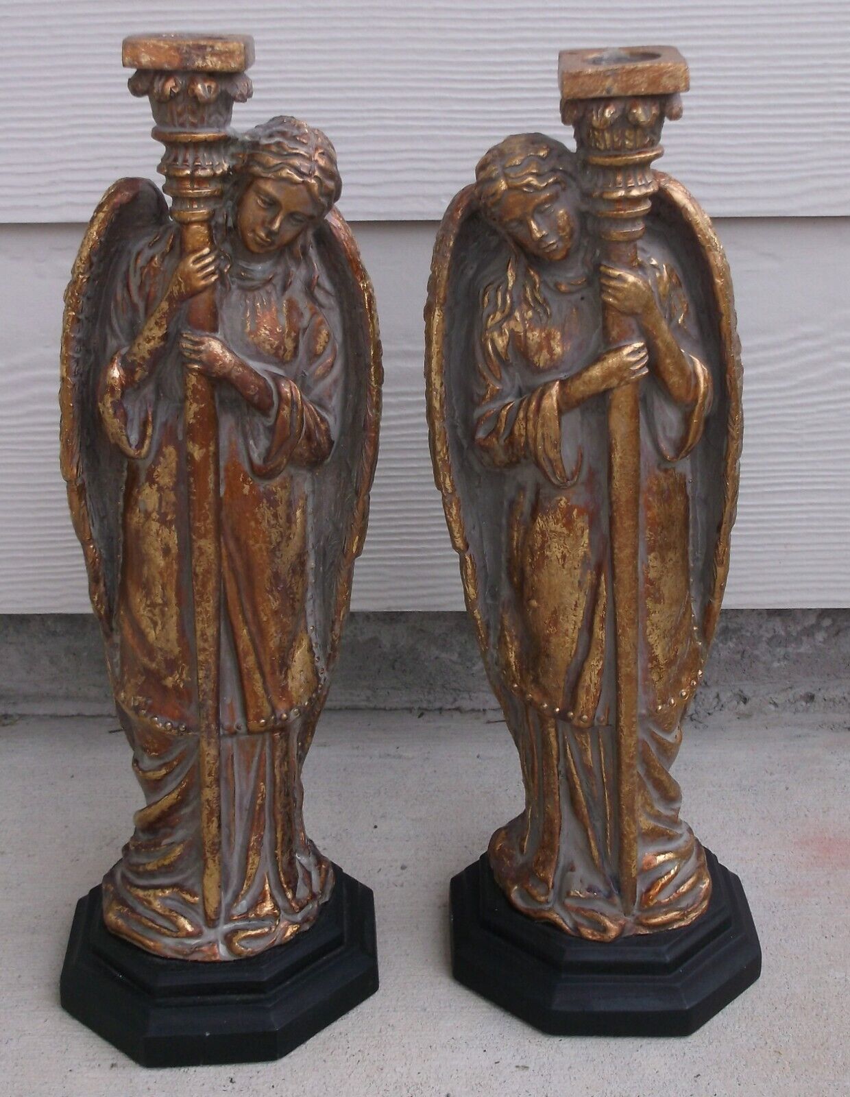 PAIR OF ANTIQUE STYLE WINGED FIGURAL CANDLE HOLDERS