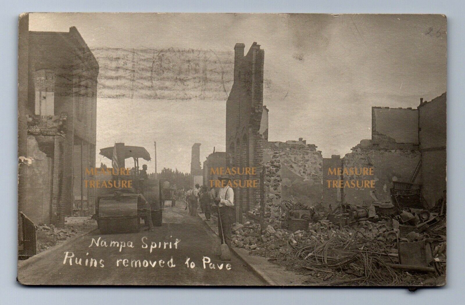 1909 RPPC WALL ST, GREAT FIRE NAMPA, IDAHO RUINS, REPAVING, US FLAG Postcard PS