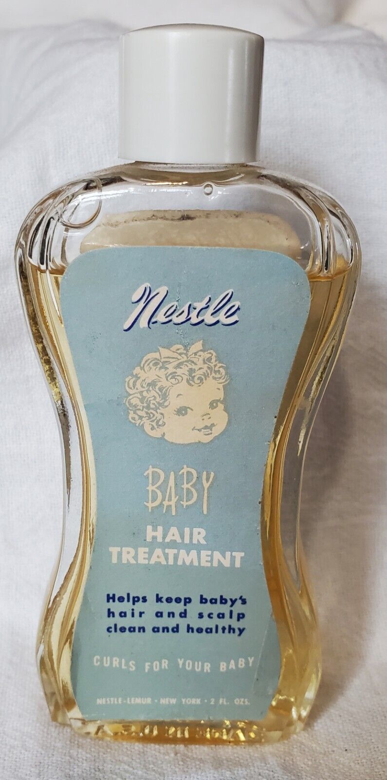Vintage Nestle Baby Hair Treatment Bottle With Contents