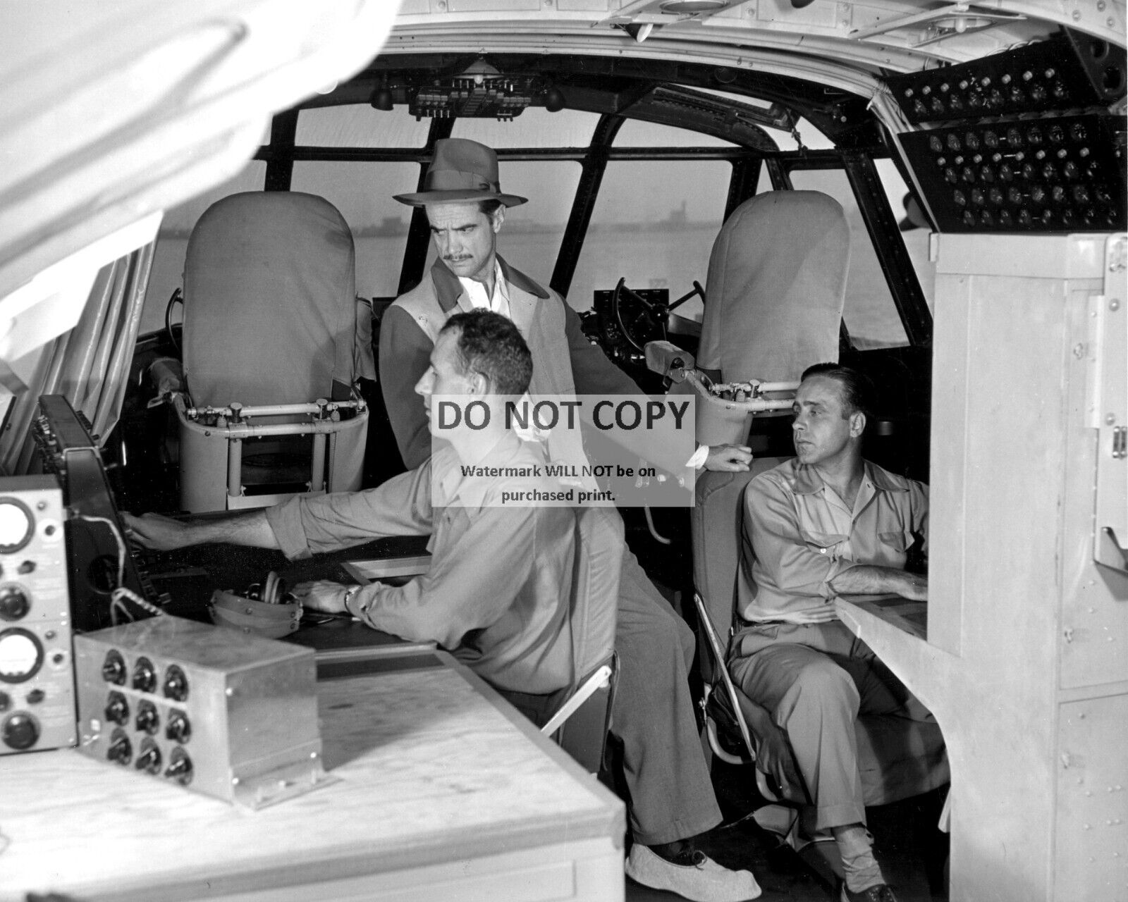 HOWARD HUGHES IN THE COCKPIT OF THE \