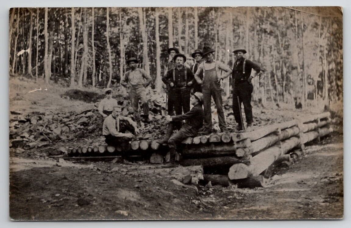 RPPC Handsome Lumberjacks Loggers Log Cabin c1910 Real Photo Postcard T22