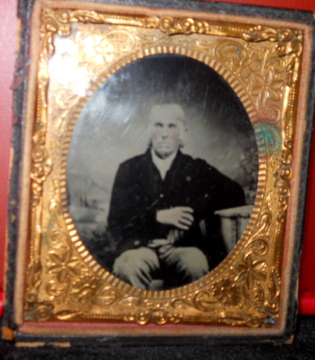 1/6th size tintype of man in half case