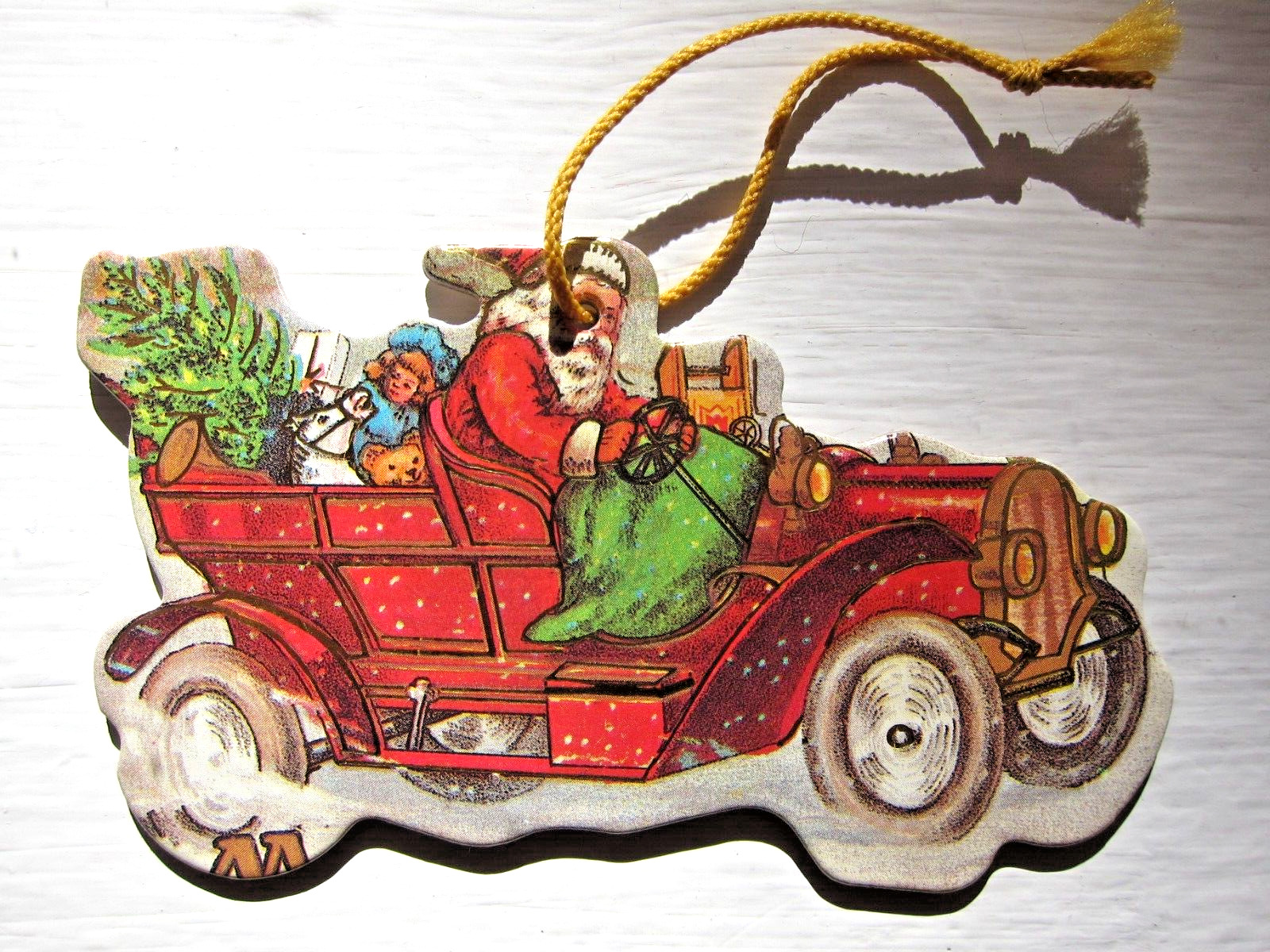 Vintage Die Cut Cardboard Christmas Ornament/Decor Santa Claus in Antique Car