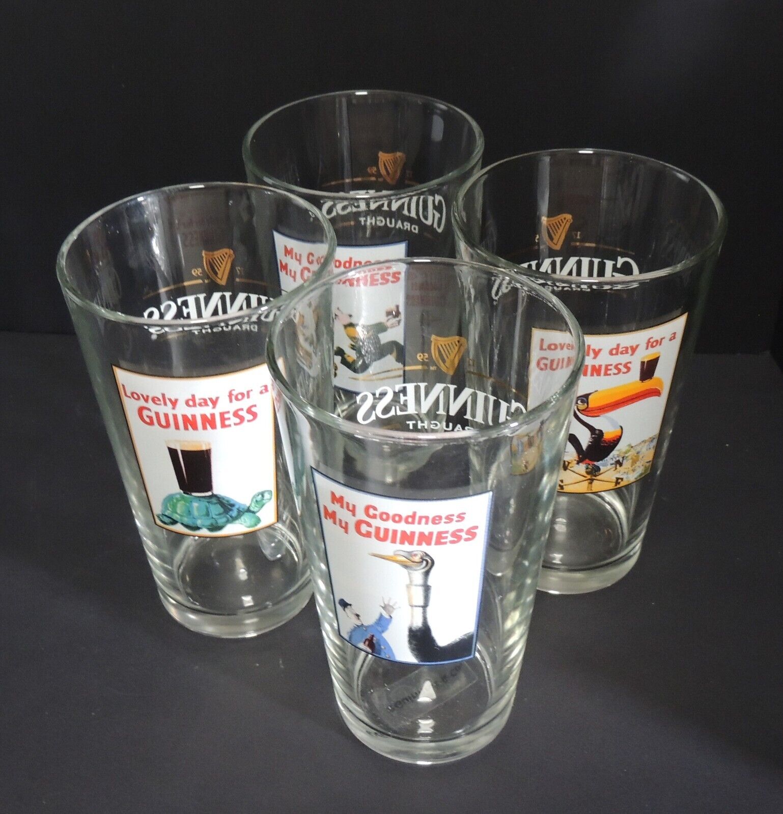 Guinness Pint Glass Set of 4 My Goodness Toucan Lovely Day For A Guinness Lion