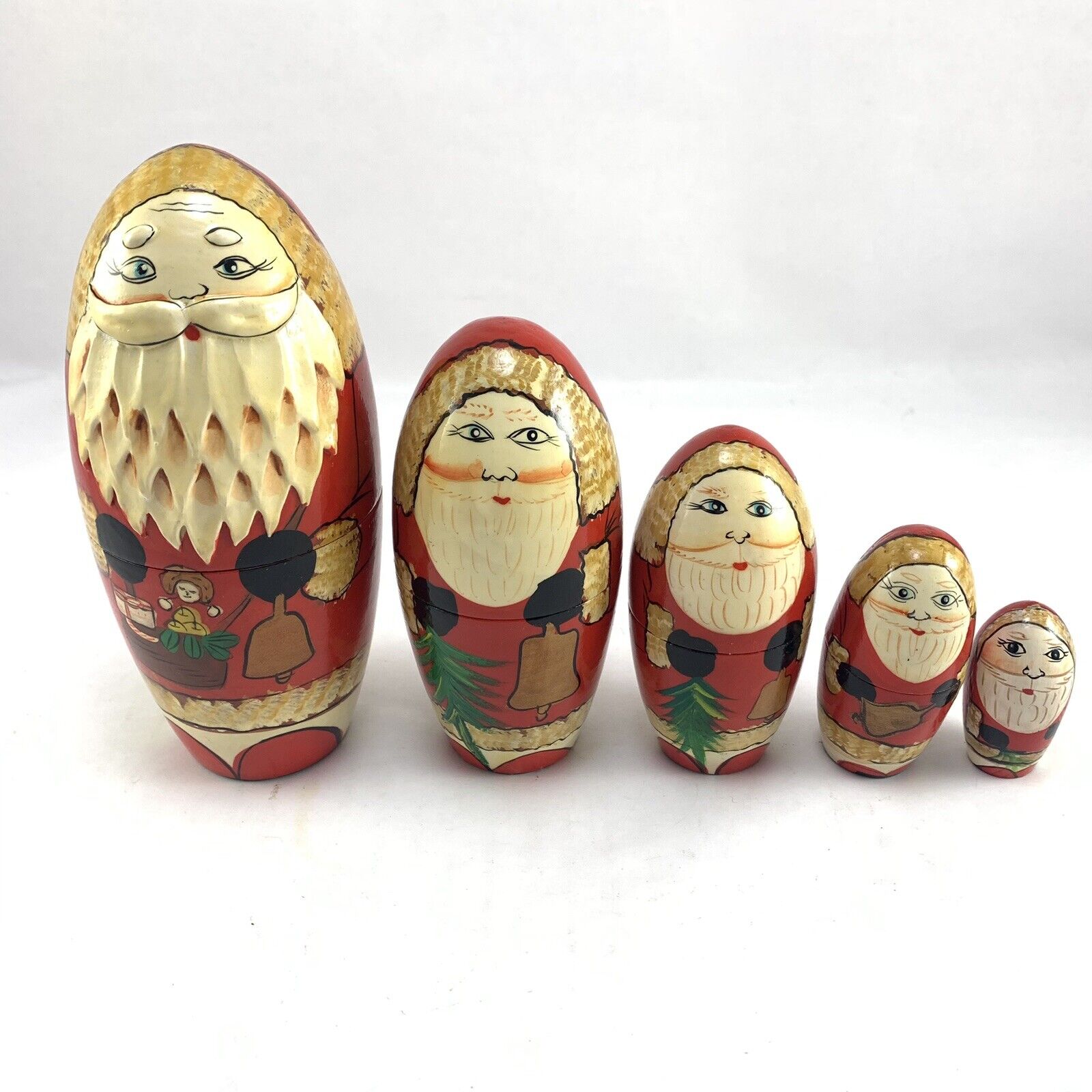 Vtg Santa Claus Nesting Dolls Wooden Holding Toys Christmas Oval Set Of 5