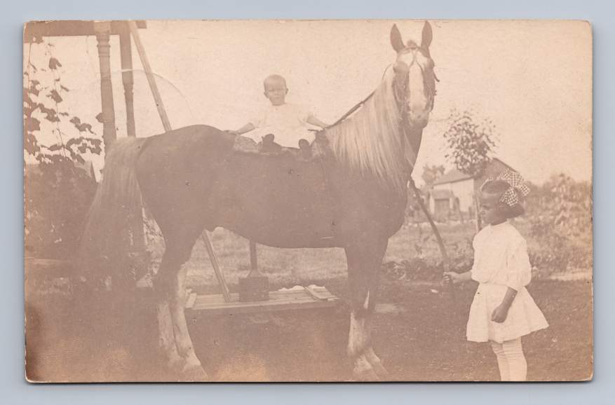 Little Girl w Baby Sibling Riding Horse RPPC Woodburn Indiana Antique Photo 1908