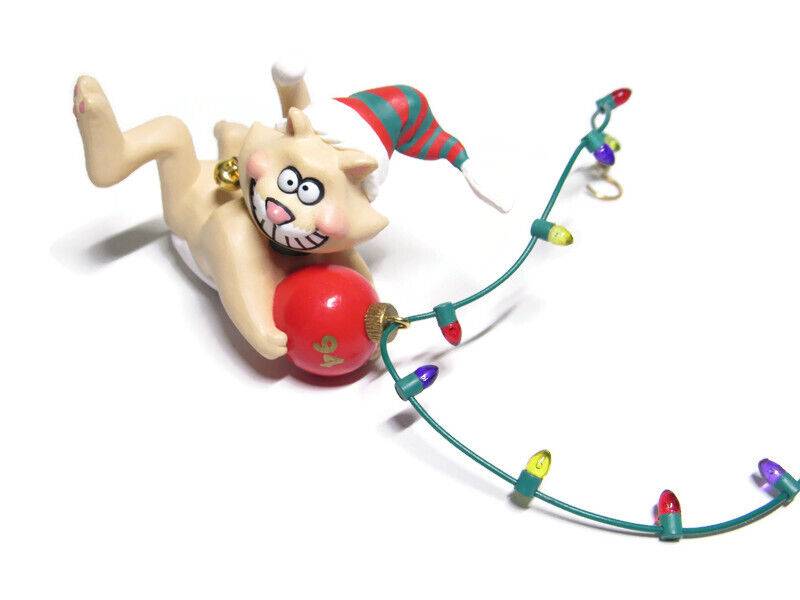 VTG Grinning Cat Swinging on Strand of Christmas Lights holding a Christmas Bulb