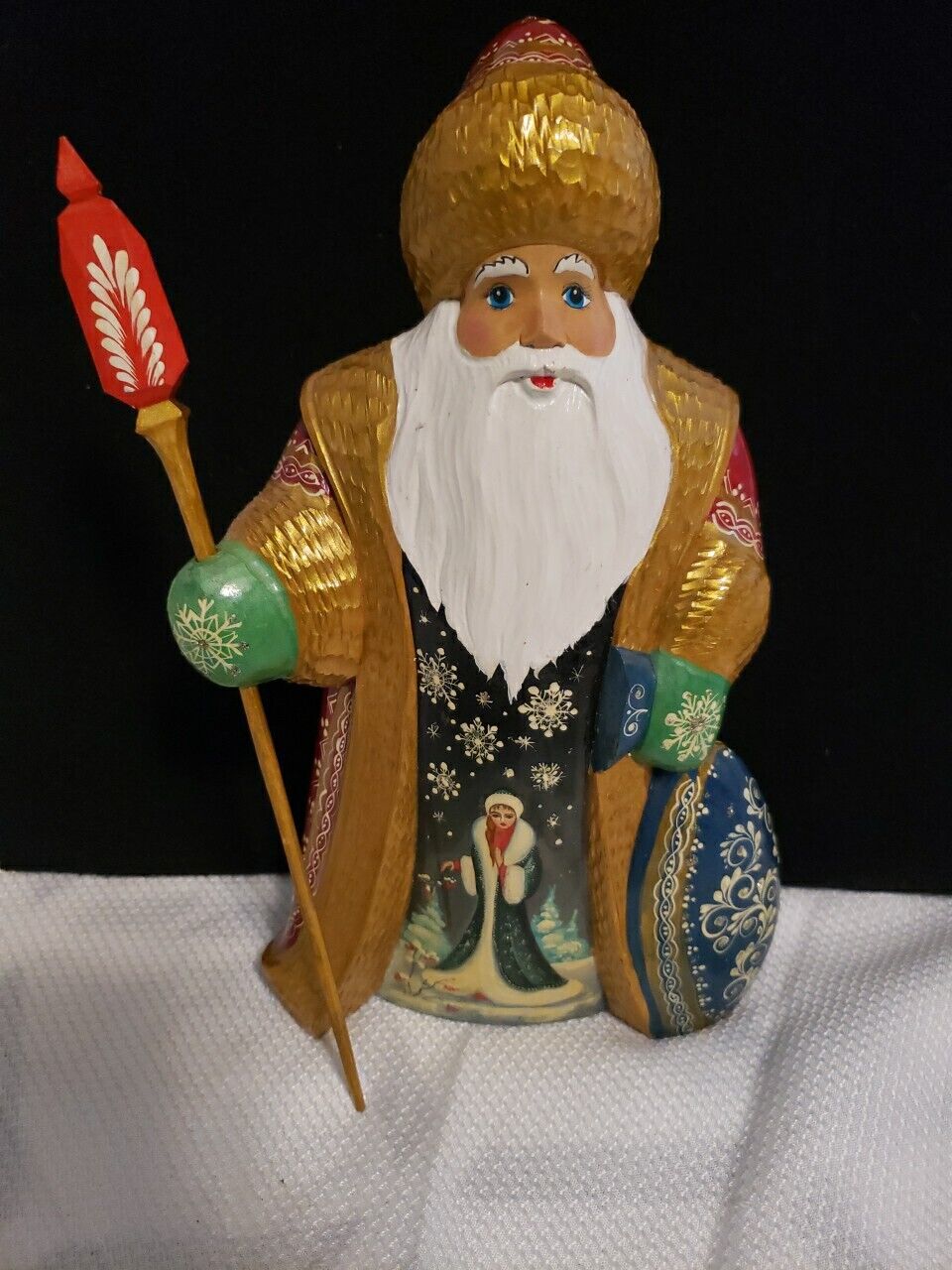 Hand carved ,hand Painted Wood Russian santa signed.