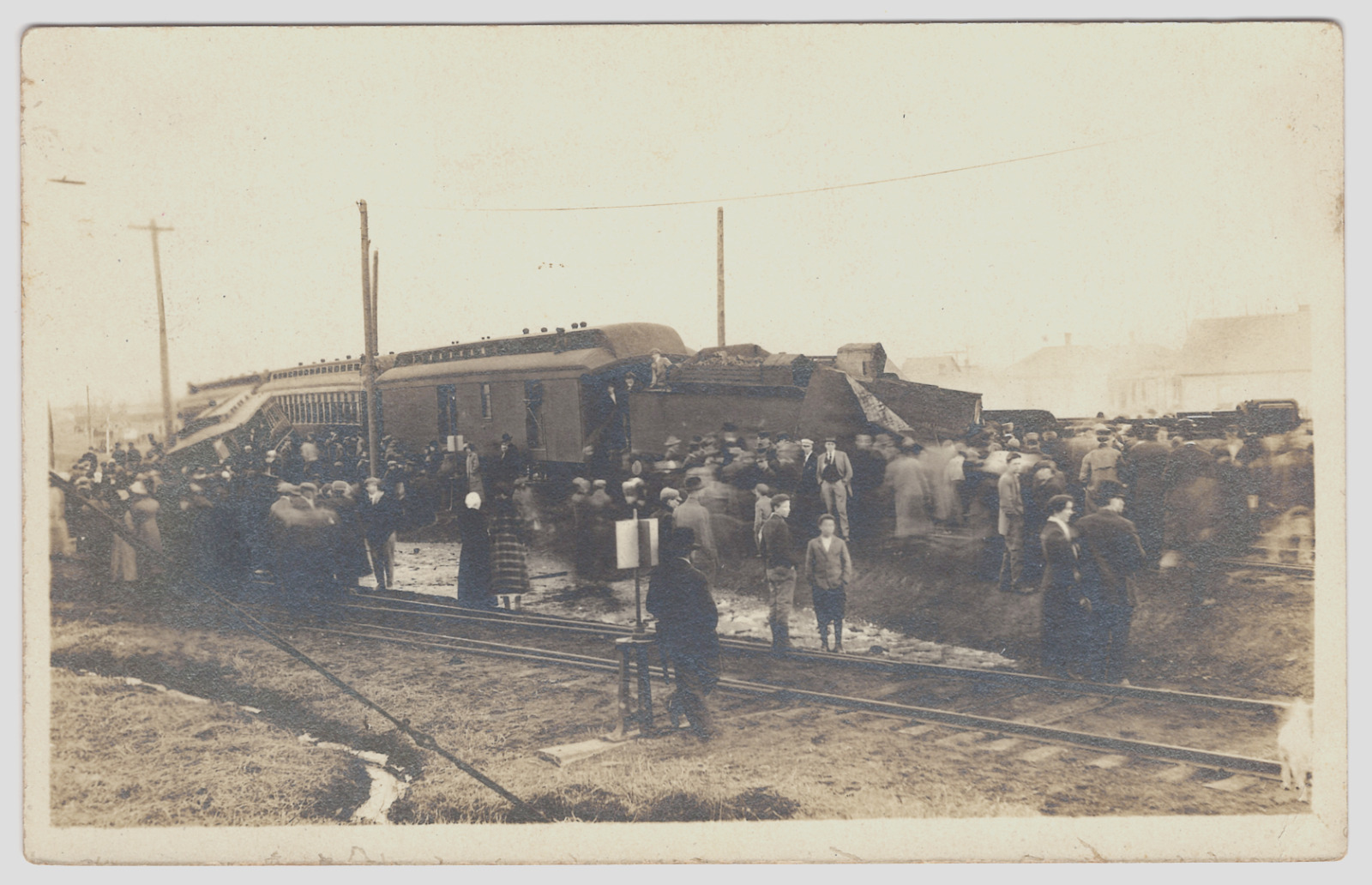 Postcard RPPC Train Wreck Derailment People Railroad Houses