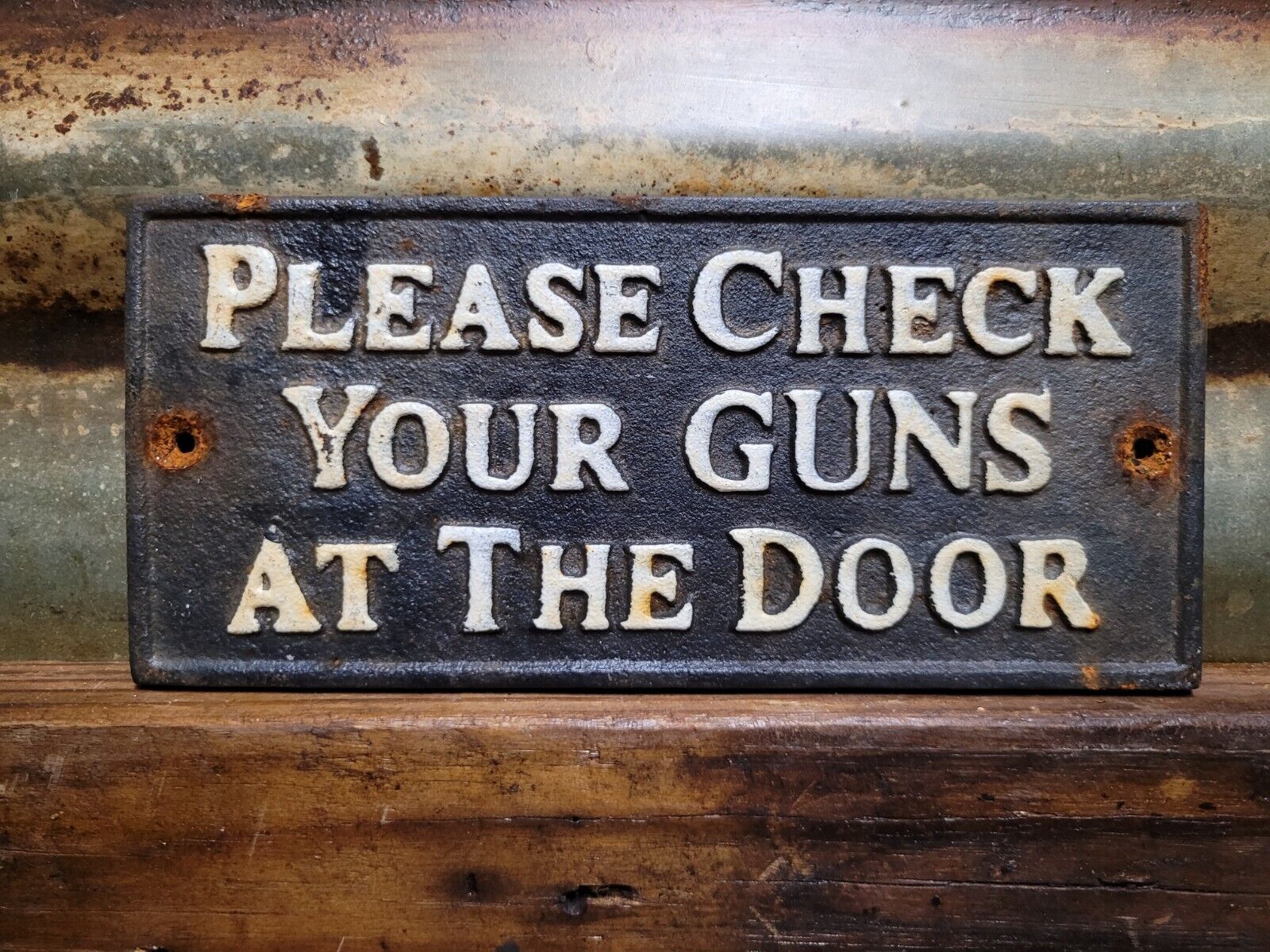 VINTAGE CHECK YOUR GUN AT THE DOOR SIGN OLD CAST IRON FIREARM RIFLE RULES PLAQUE