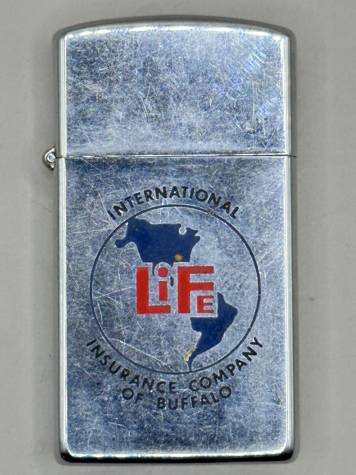 Vintage 1961 Life International Insurance Buffalo Chrome Slim Zippo Lighter