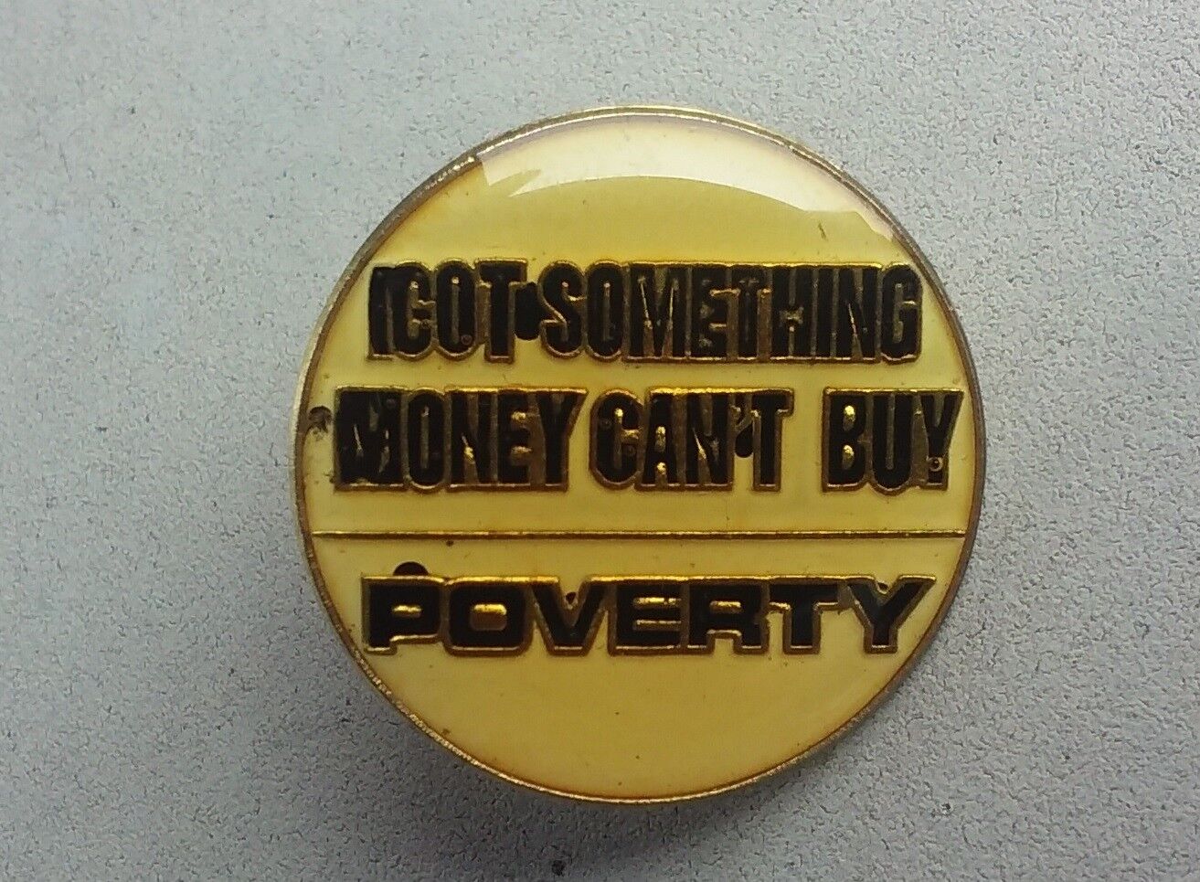 Poverty I Got Something Money Can\'t Buy vintage lapel pin badge