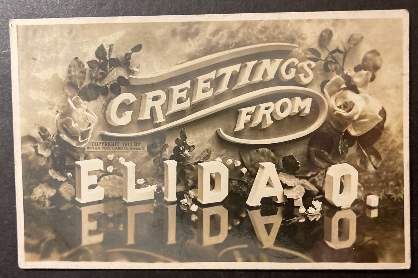 Greetings from Elida Ohio RPPC cprt 1911 Bryan Post Card Co Large Letter