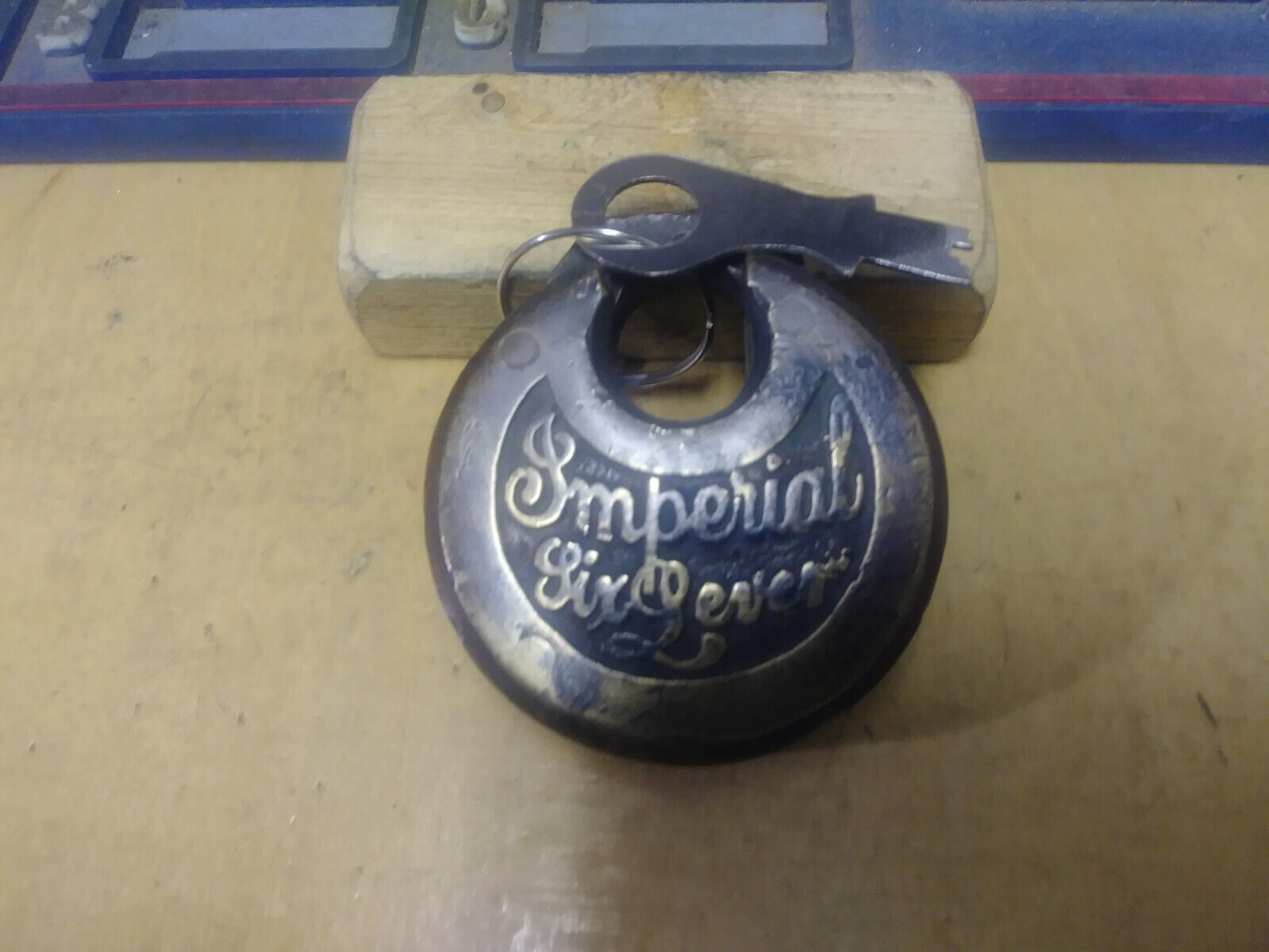 antique/vintage IMPERIAL 6 lever push key pancake padlock  w/key   23